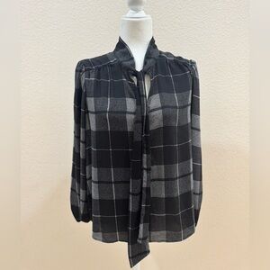 Women’s black and white blouse and Taylor size large petite